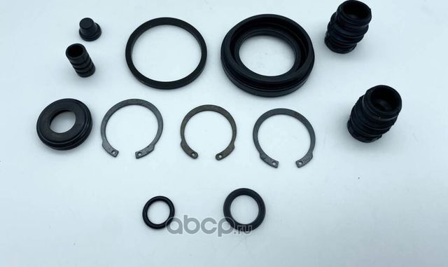 Ремкомплект тормозного суппорта заднего (для поршня d 38 mm  суппорт Lucas/Tokico) NISSAN Almera Tin (Magtechnic). Артикул mag0261rk