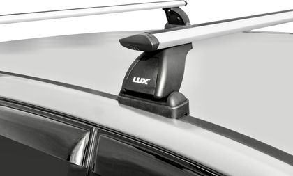 Багажник на крышу LUX на штатные места для BMW 3-Серия E91 хэтчбек 5-дв. 2005-2011 (Аэро-трэвэл дуги шириной 82 мм). Артикул 842075+846059