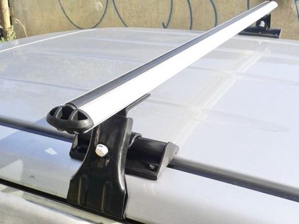 Багажник на крышу Муравей Д-1 креп. за дверные проемы для Toyota Corolla E100 седан 1991-1997 (Аэро-классик дуги). Артикул 691479+698874