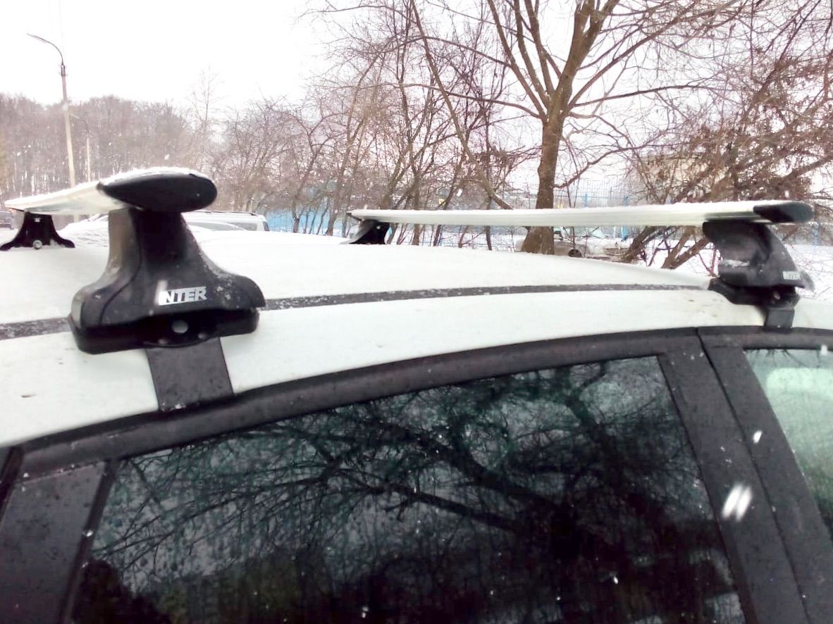 Багажник INTER на гладкую крышу для LADA X-Ray хэтчбек 2016-2026 (Крыловидные дуги). Артикул 8801-1205