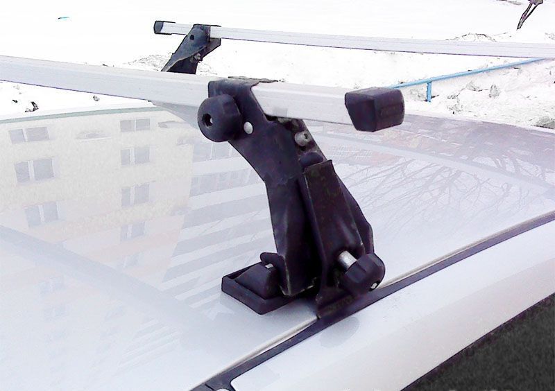 Багажник на крышу Атлант Эконом креп. за дверные проемы для Lada Granta седан 2011-2026 (Прямоугольные дуги). Артикул 8931