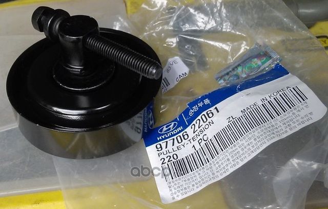 Натяжной ролик (натяжитель) приводного поликлинового ремня Hyundai / KIA. Артикул 9770622061