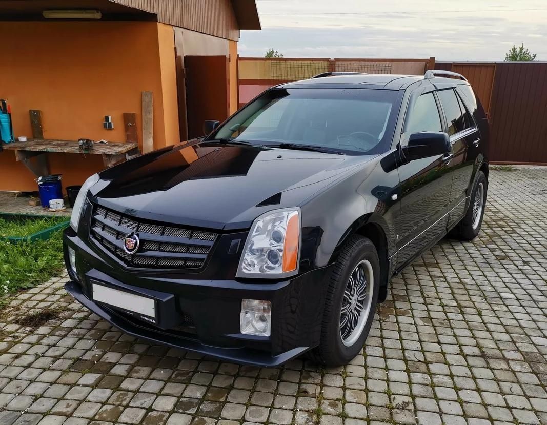 Дефлекторы Cobra Tuning для окон Cadillac SRX I 2004-2009. Артикул C10104