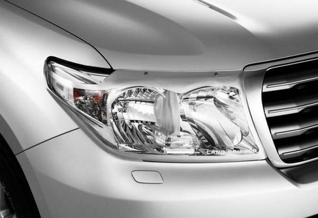 Защита фар Toyota (оригинал) для Toyota Land Cruiser 200 рестайлинг 2015-2021 Прозрачная. Артикул PZ451-70990-ZA