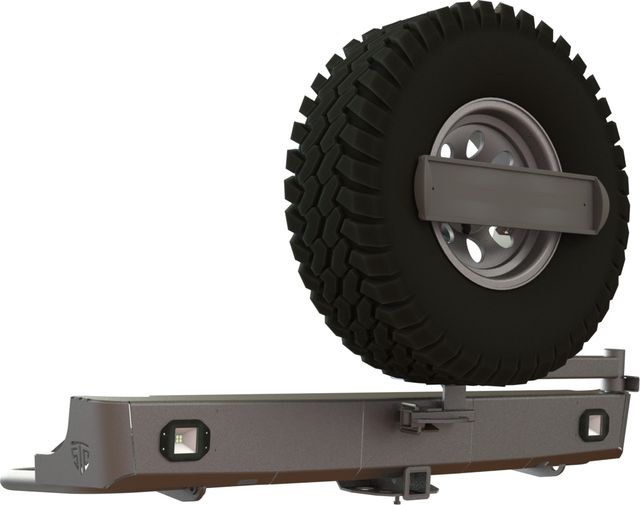 Бампер силовой STC задний для Toyota Hilux VII 2004-2015 с квадратом под фаркоп, кронштейном крепления запасного колеса по центру, кронштейном крепления гос номера и дублирующими фонарями. Артикул STC-TH05-BR-C1-L1